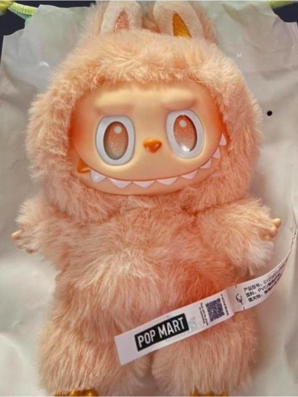 Peach labubu big into energy